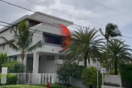kite surfer dies after strong winds throw him nearby building