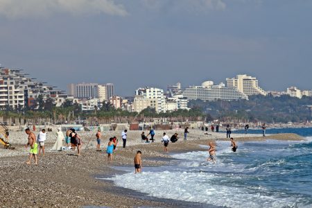 People in Antalya rushed to beaches after seeing the sunny weather instead of a thunderstorm