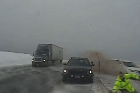 US Highway Patrol trooper barely escapes being hit by a vehicle