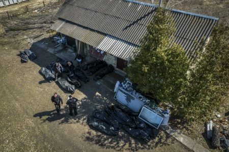 Dozens of civilian bodies await burial in the streets of Bucha