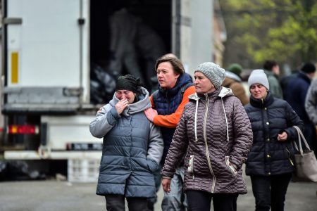 People are waiting in grieve to find their dead ones in Bucha