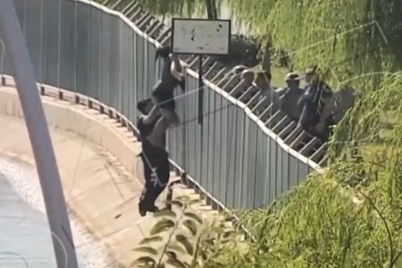police rescue woman from irrigation canal