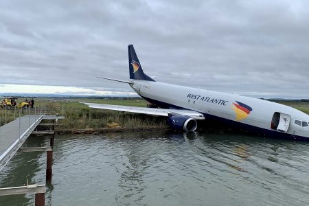 Landing accident gets plane into pond in France