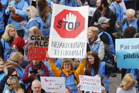 Latvian teachers and medical workers protested policies on their sectors