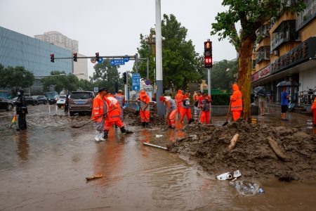 Beijing’s Streets Covered in Mud After Severe Flooding