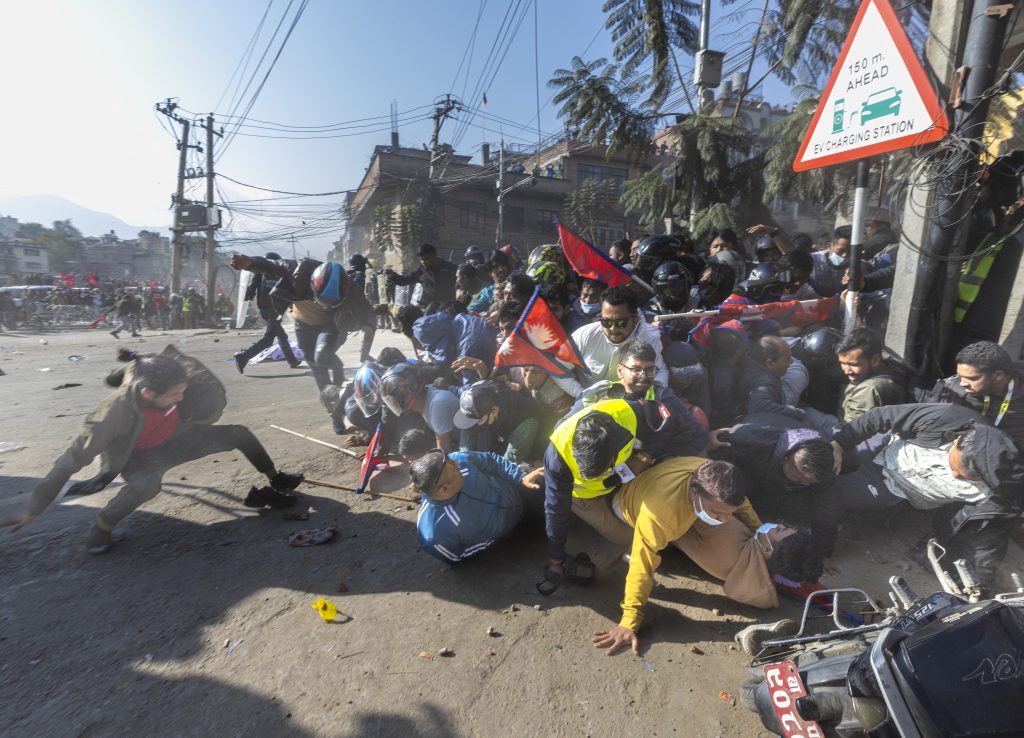 Nepalese police and pro-monarchy protesters clash in Kathmandu