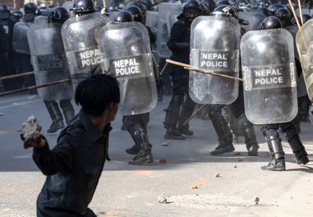 Nepalese police and pro-monarchy protesters clash in Kathmandu