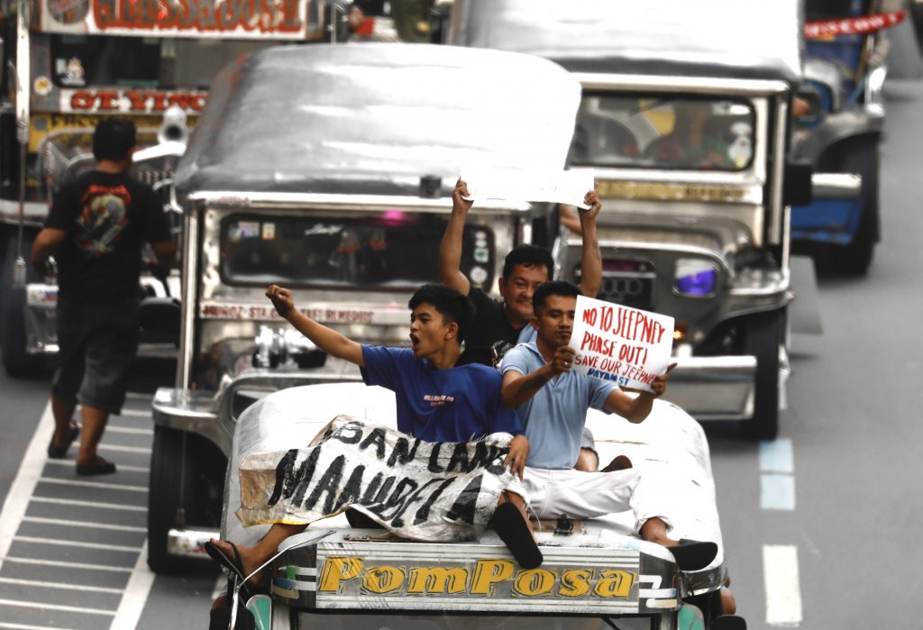 Philippines' jeepney drivers protest against government's plan to phase out old vehicles