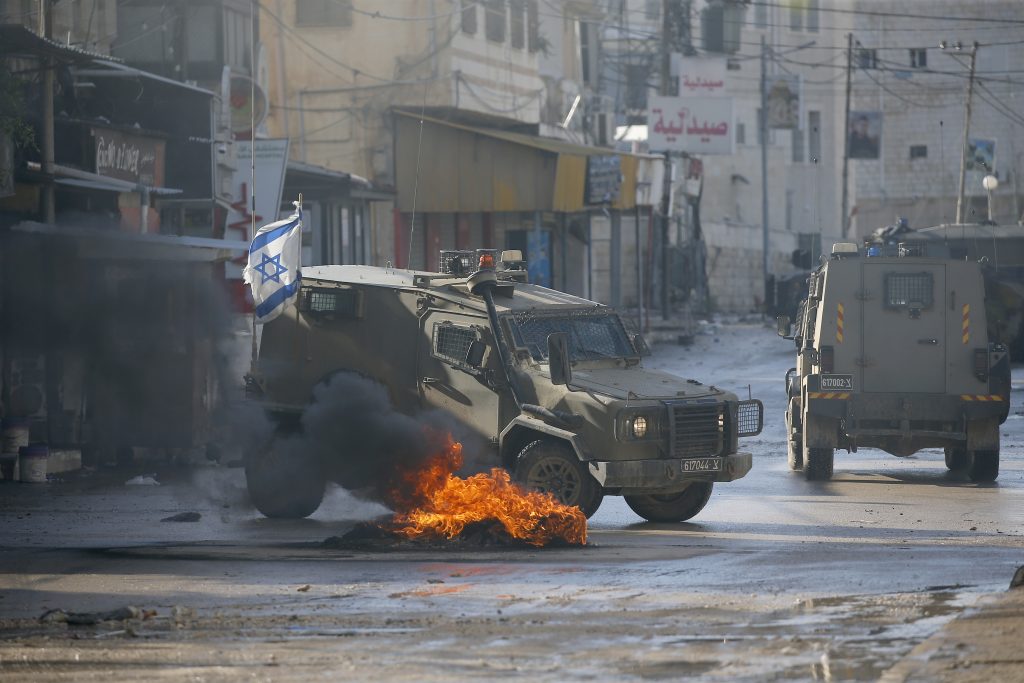 Israeli forces raid Jenin camp killing eight Palestinians in the West Bank