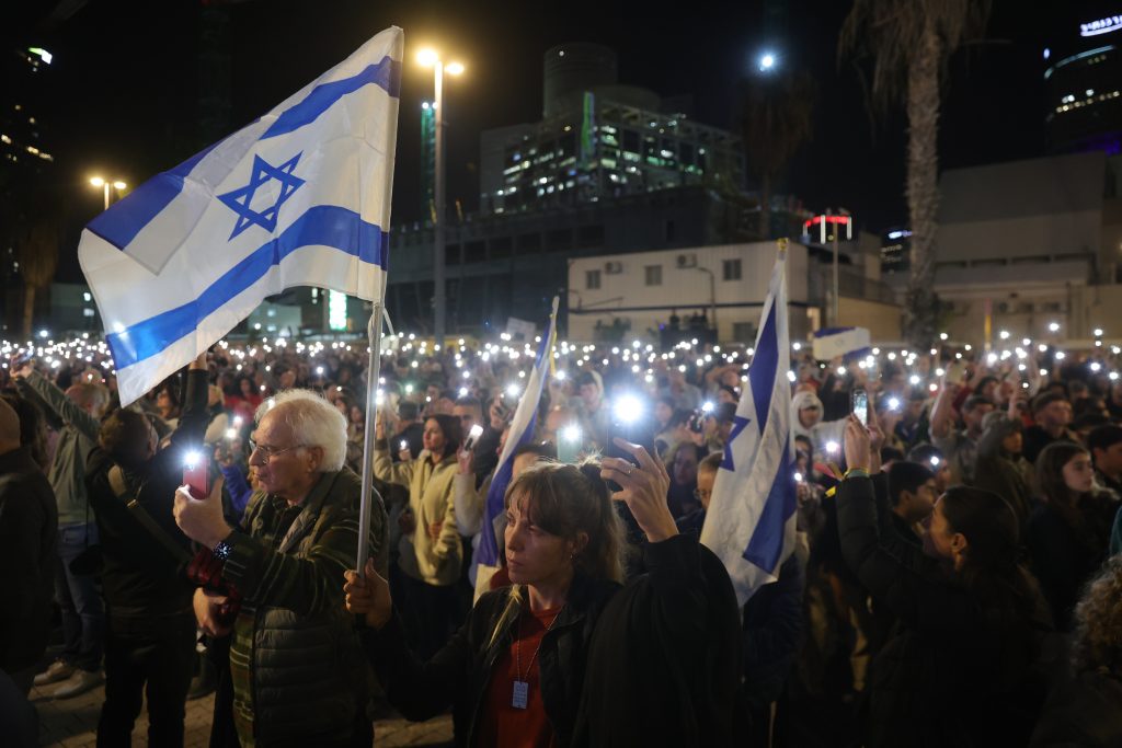 Families of Israeli hostages held by Hamas protest in Tel Aviv