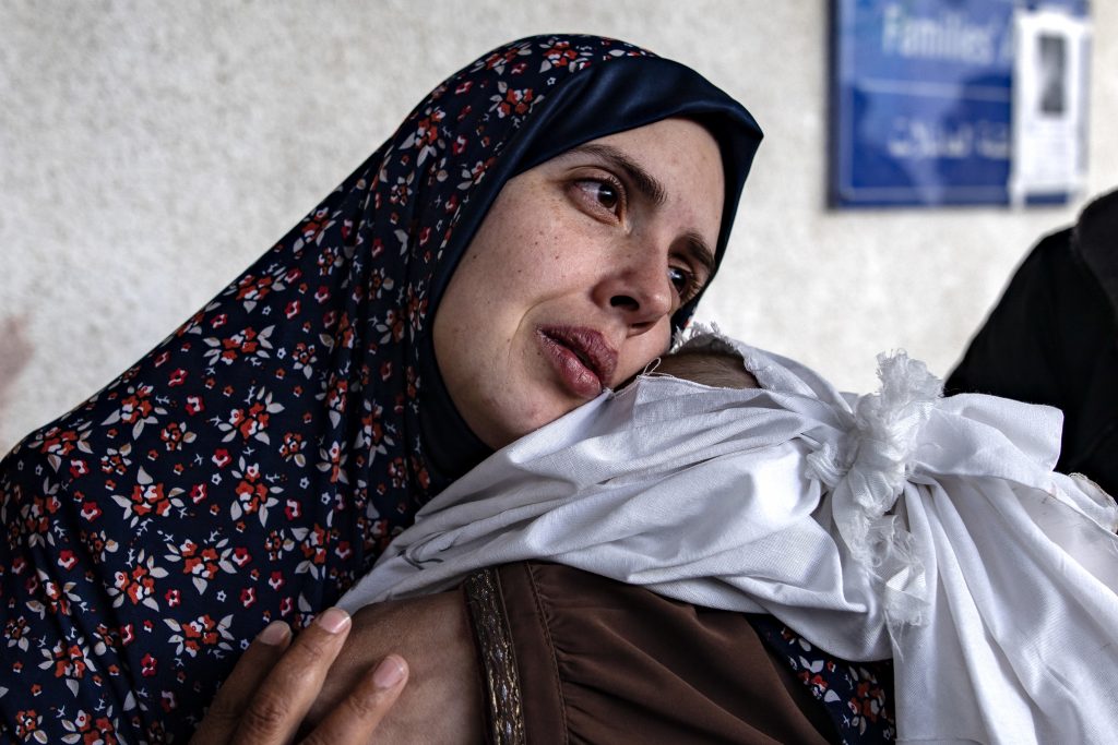 Palestinians mourn their dead following recent Israeli airstrikes in Rafah