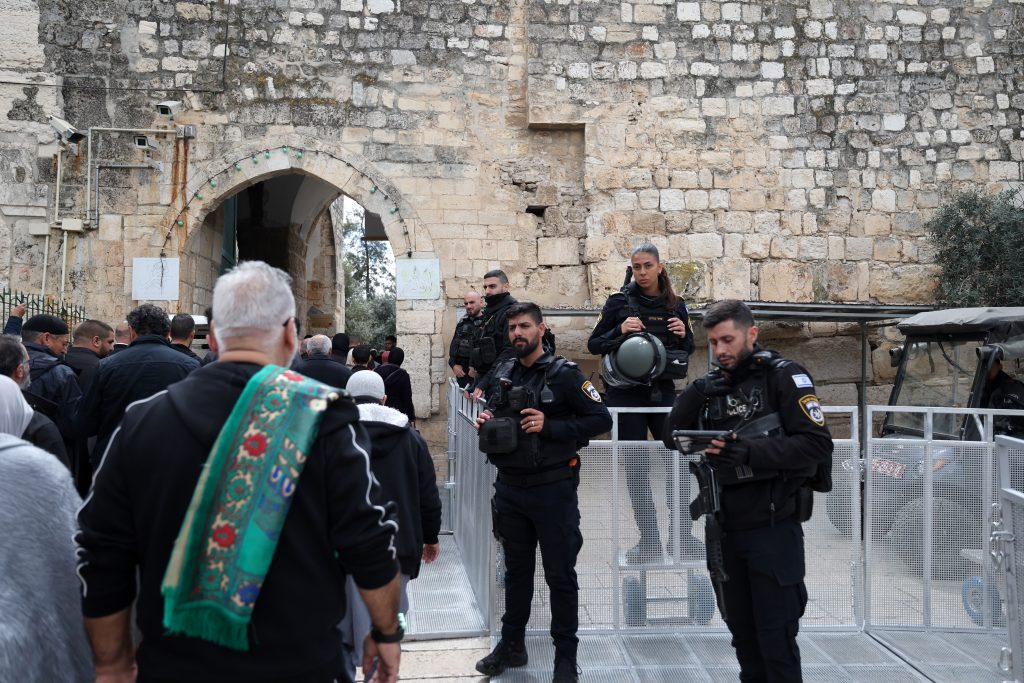 Muslims make their way to attend Ramadan Al-Aqsa Friday prayer in Jerusalem