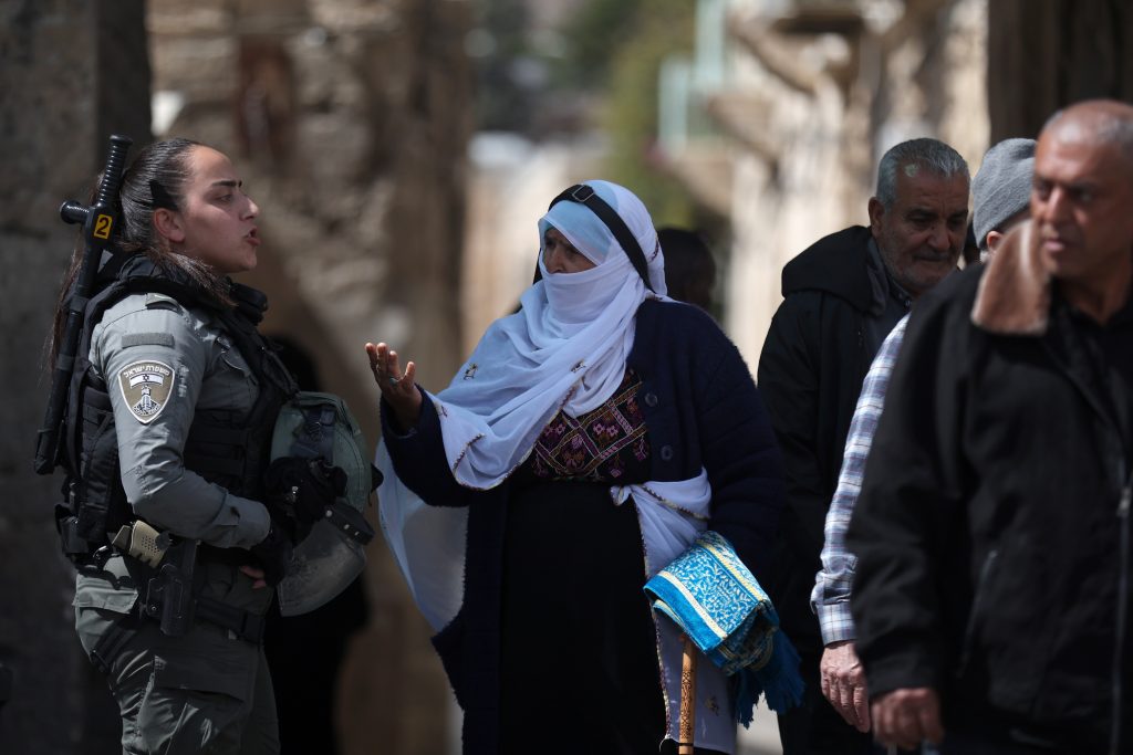Muslims make their way to attend Ramadan Al-Aqsa Friday prayer in Jerusalem