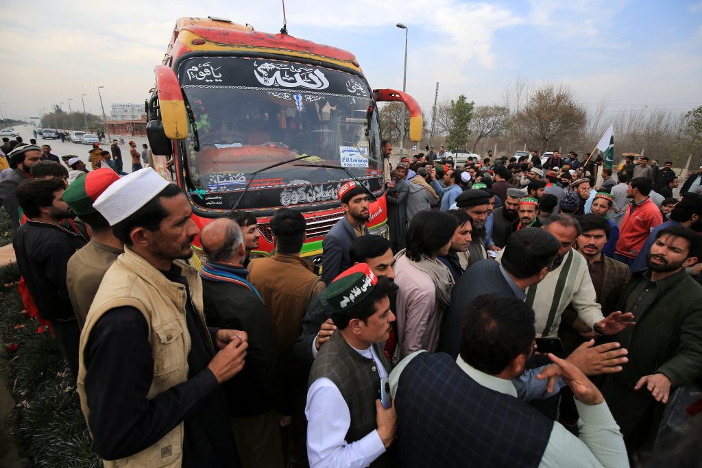 Supporters of PTI party protest against alleged rigging in general elections in Peshawar