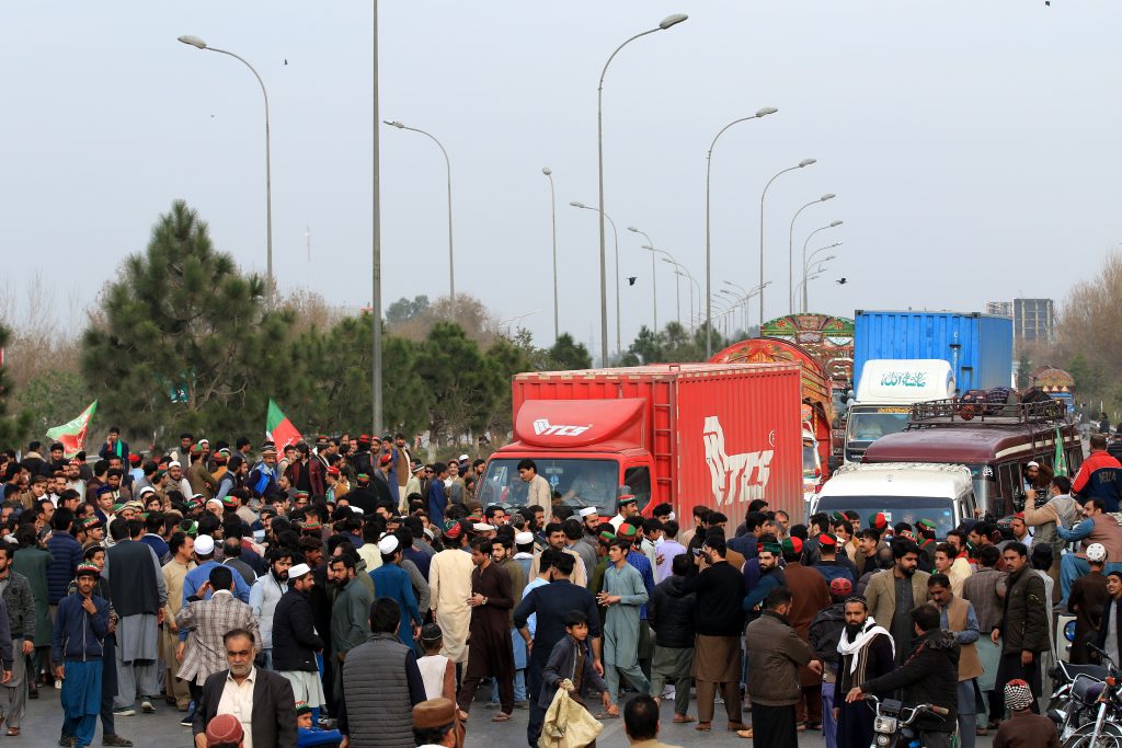 Supporters of PTI party protest against alleged rigging in general elections in Peshawar