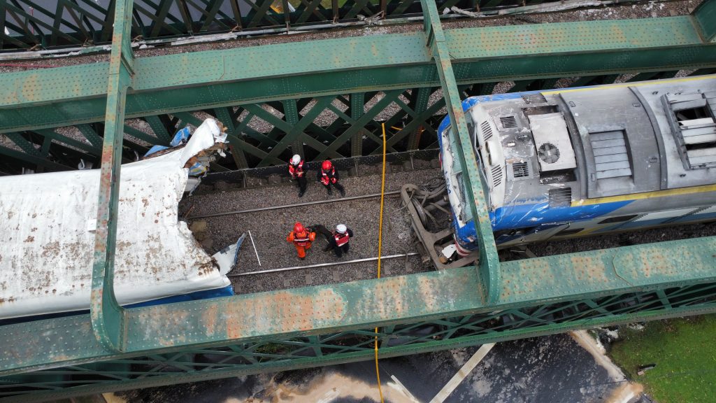 At least 60 people injured after train collides with locomotive in Buenos Aires