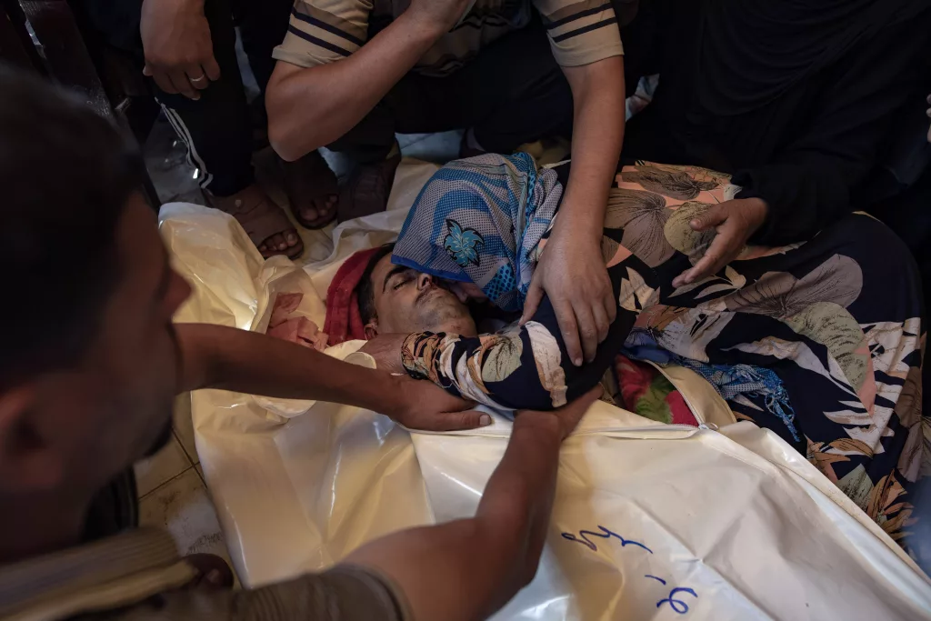 Injured Palestinians transported to Nasser Hospital in Khan Yunis after Israeli bombing of Hamas positions