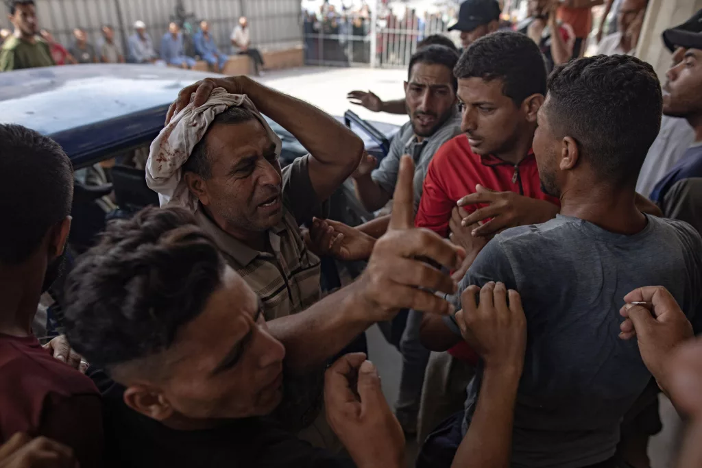 Injured Palestinians transported to Nasser Hospital in Khan Yunis after Israeli bombing of Hamas positions
