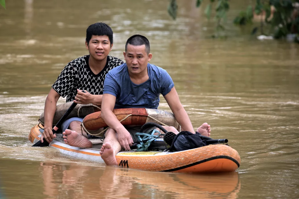 Red River's rapid rising floods riverbank communities triggered by Typhoon Yagi