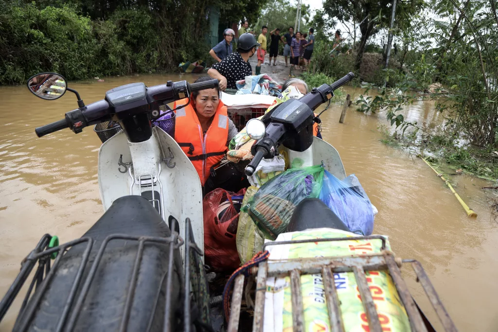 Red River's rapid rising floods riverbank communities triggered by Typhoon Yagi