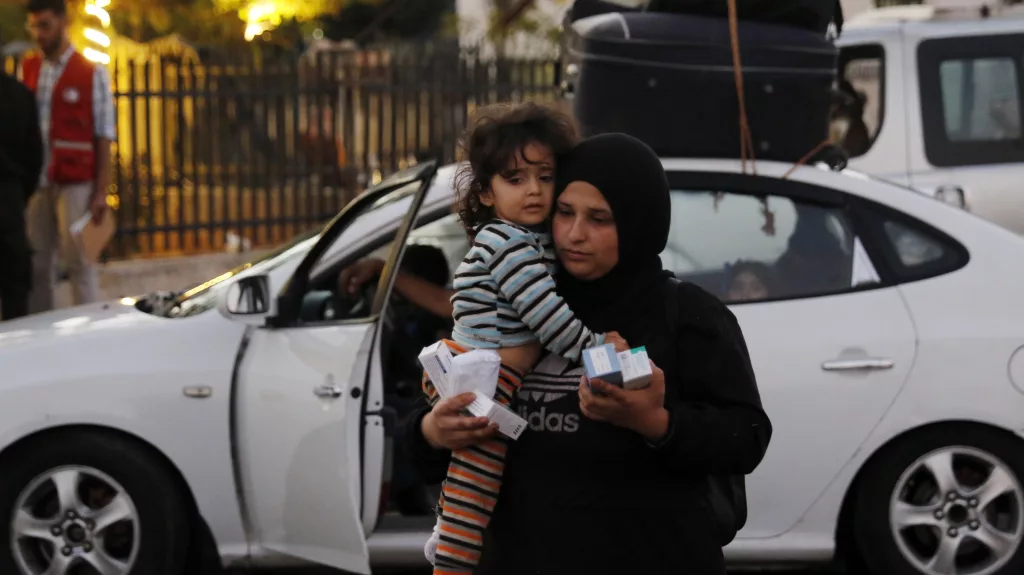 People who fled from southern Lebanon enter Syria following Israeli military strikes in recent days