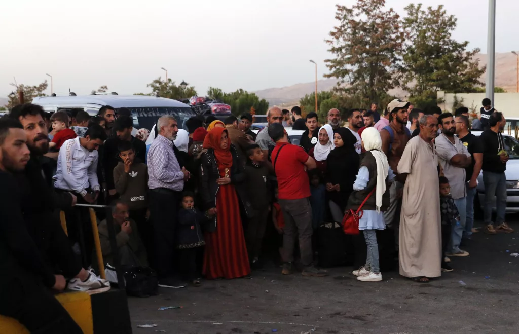 People who fled from southern Lebanon enter Syria following Israeli military strikes in recent days