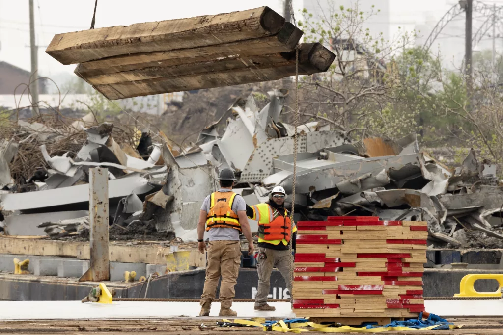 Authorities work to clean up the wreckage of the Francis Scott Key Bridge and reopen the Port of Baltimore