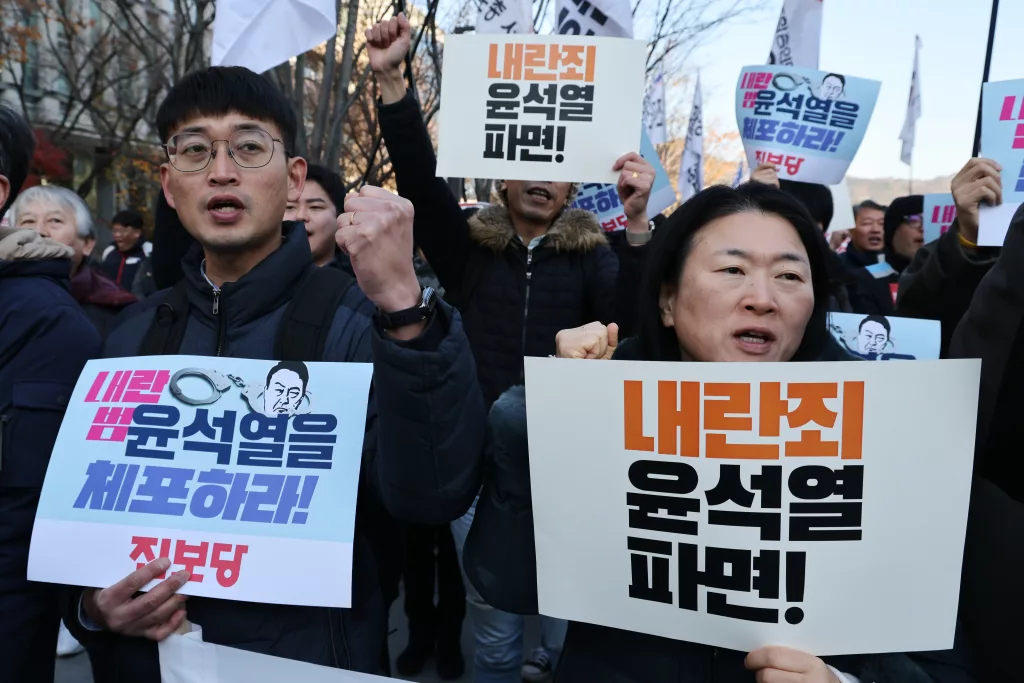 South Korea's President Yoon says he will lift the emergency martial law