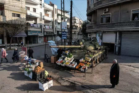 Syrian Shopkeeper Turns Assad’s Tank Into Greengrocer’s Stall