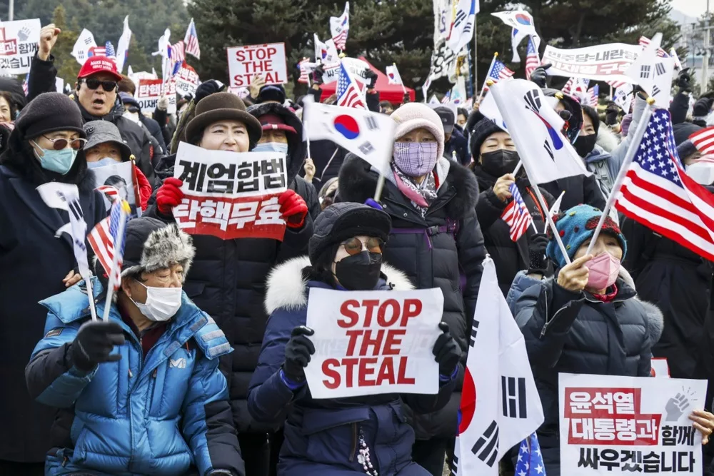 Supporters of impeached South Korean President Yoon rally outside his detention center in Uiwang