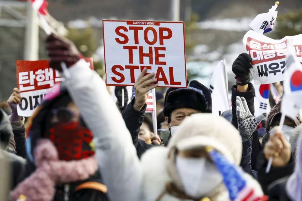 Supporters of impeached South Korean President Yoon rally outside his detention center in Uiwang