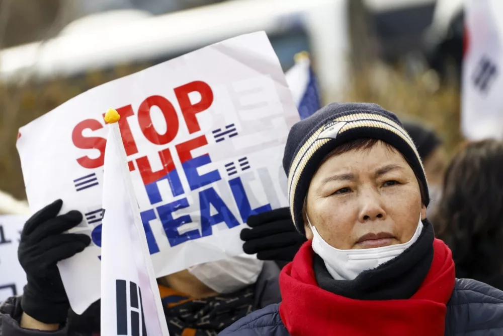 Supporters of impeached South Korean President Yoon rally outside his detention center in Uiwang
