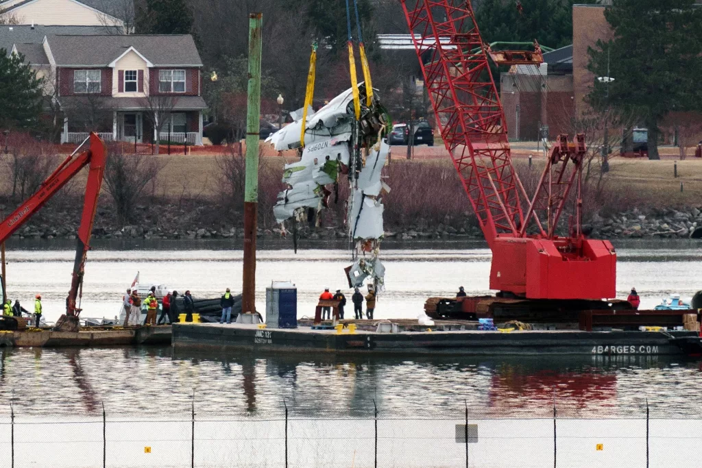 Recovery efforts after passenger jet collided with military helicopter in Washington DC
