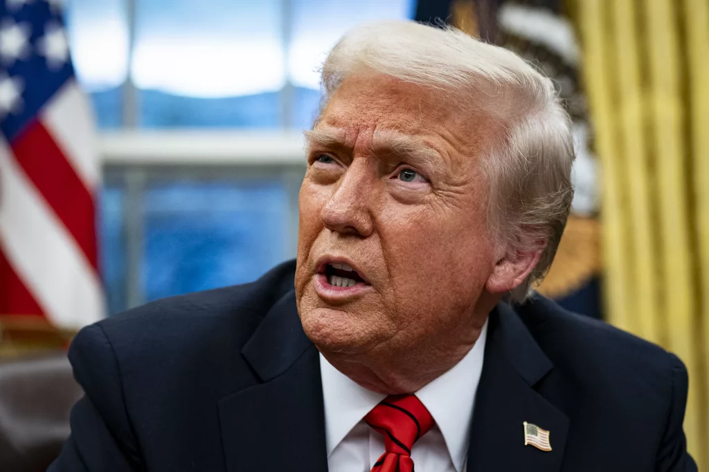 US President Trump signs executive order in Oval Office