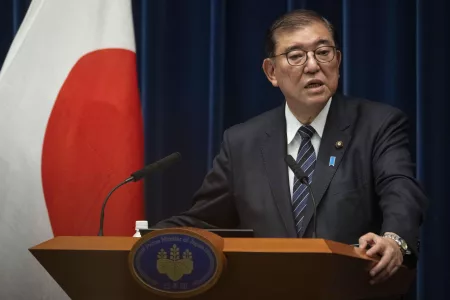 Japan PM Defends Gift Certificates Amid Controversy
