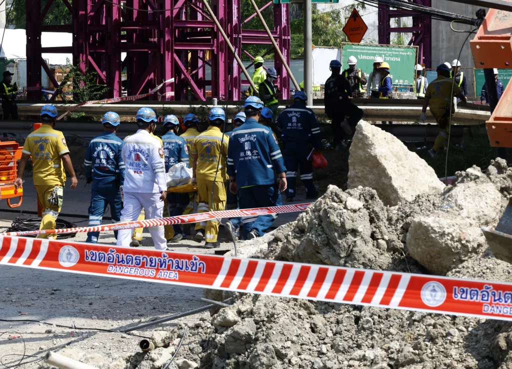 The collapse of a concrete beam from an under-construction expressway bridge kills five workers and leaves many injured