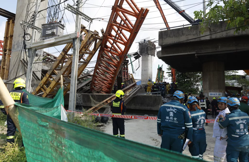 The collapse of a concrete beam from an under-construction expressway bridge kills five workers and leaves many injured
